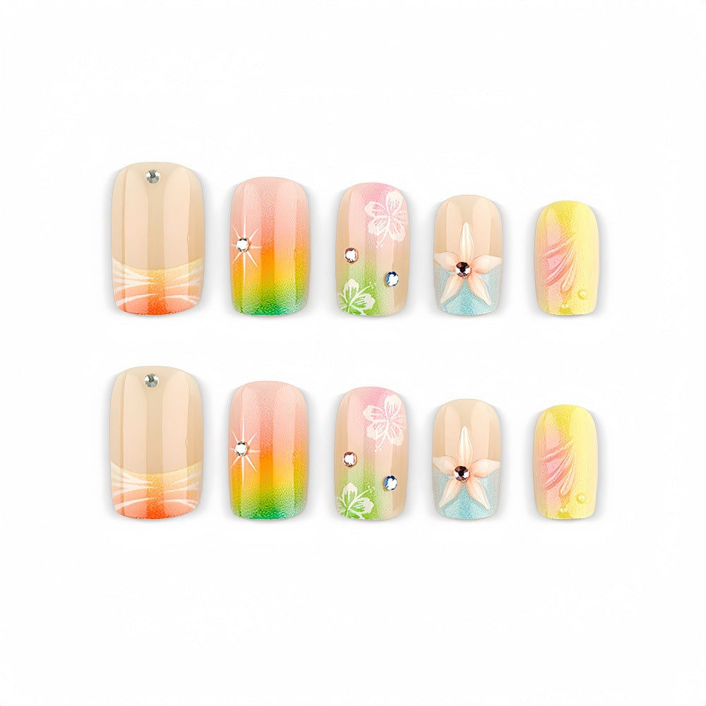 Acrylic nails with floral accents and gradient Kalsten