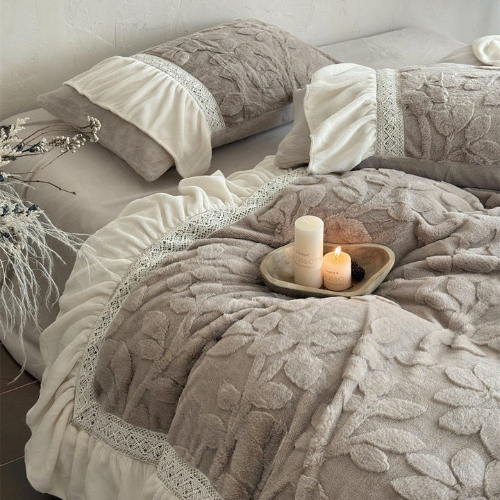 Romantic quilted bedding set with ruffle, floral relief, and neck roll