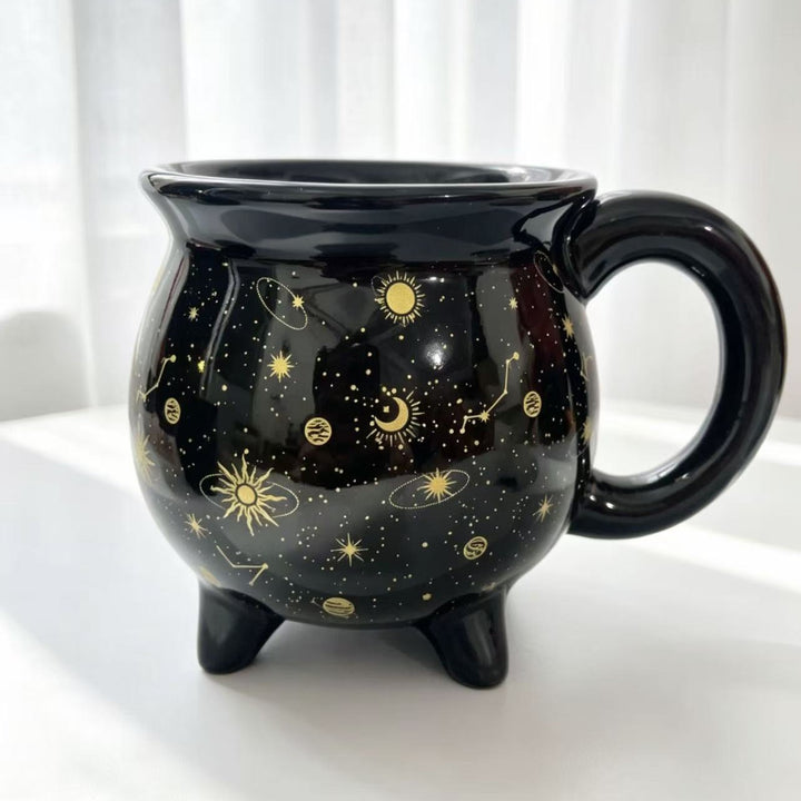 Ceramic kettle mug with star and planet decor