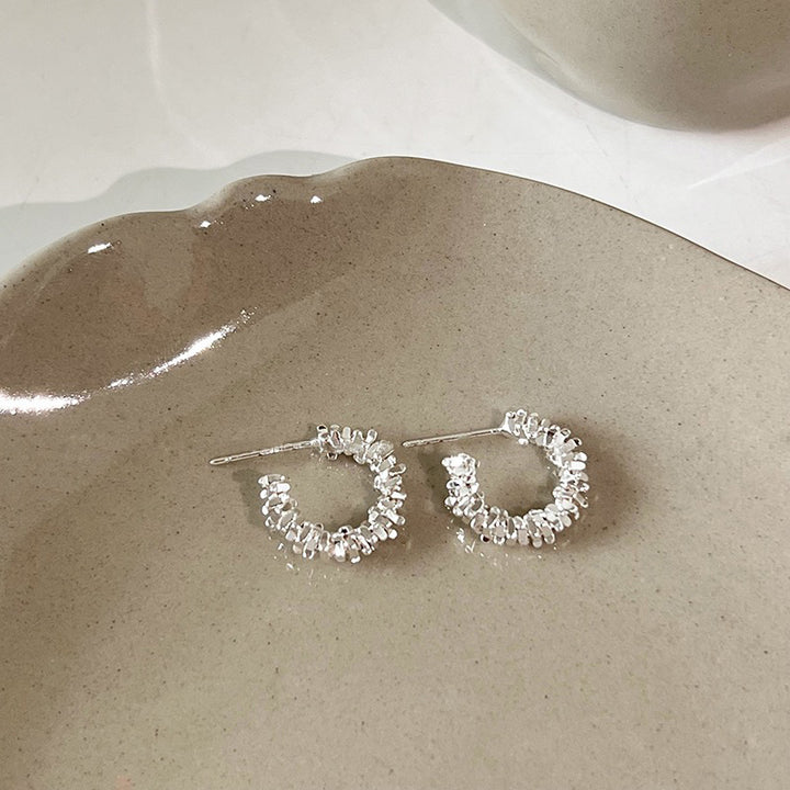 Sparkling hoops with sparkling details Kalsten
