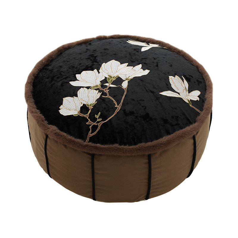 Seat pouf made of embroidered velvet with faux fur trim
