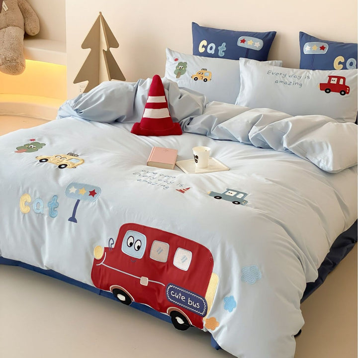 Children's bedding set with appliqued vehicle motifs made of cotton satin