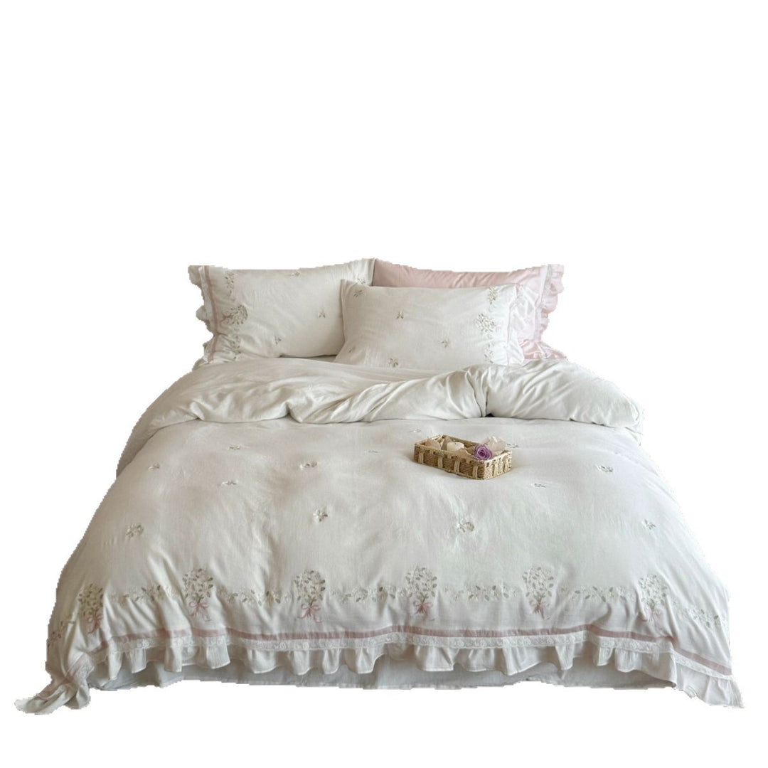 Romantic bedding set with embroidered floral border, ruffled edges and extra soft cotton cover