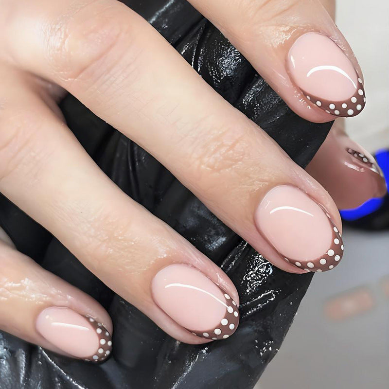 Artificial nail set with elegant French tips and subtle dots Kalsten