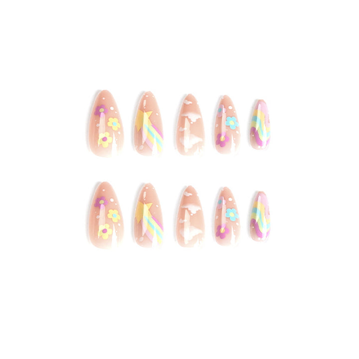 Artful nail art with cheerful designs and colorful accents Kalsten