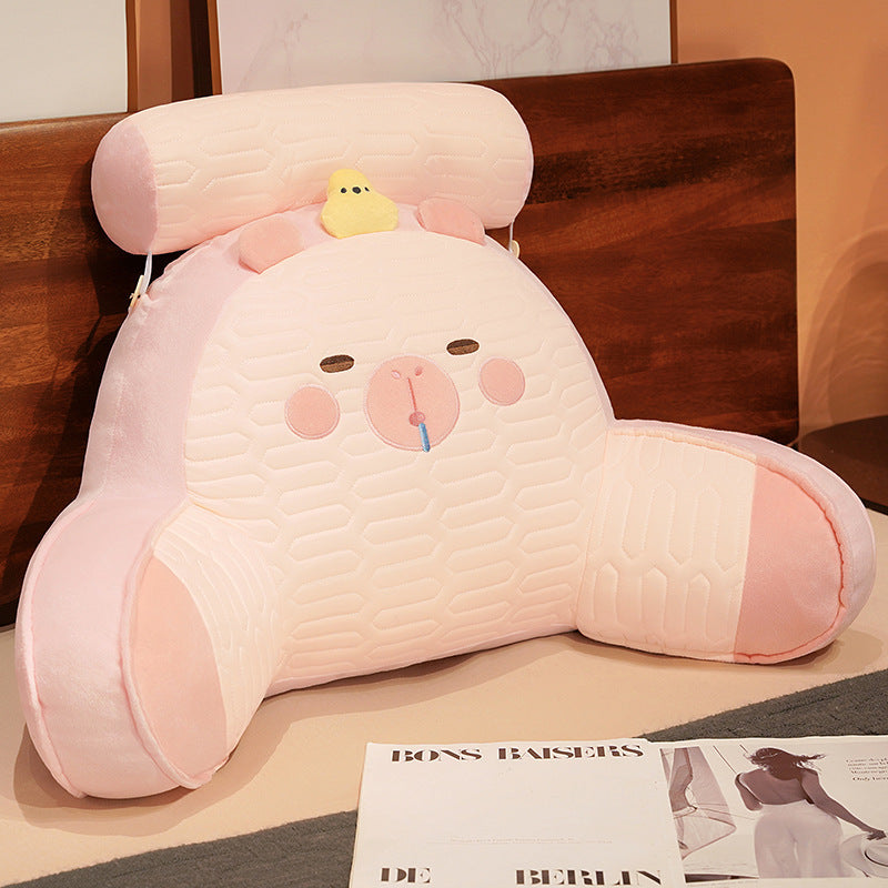 Padded reading pillow with armrests and removable neck roll in cute pig plush design