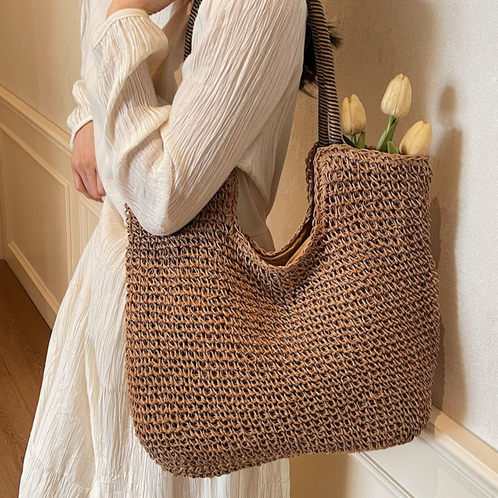 Elegant Handbag Made from Hand-Woven Natural Material with Striped Handles Kalsten