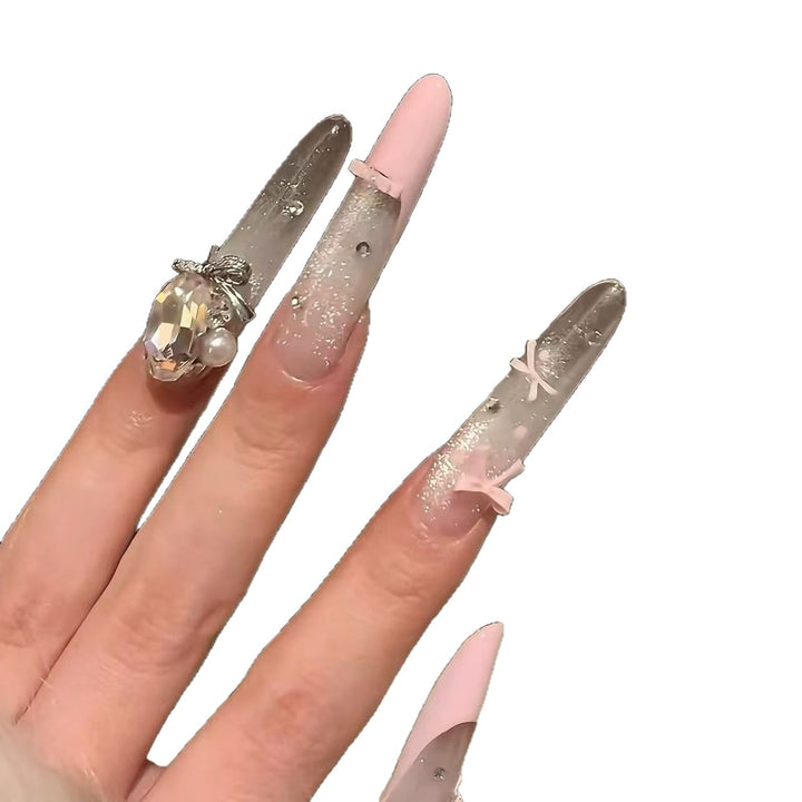 Glamorous Long Stiletto Nail Art Extensions with Rhinestone Accents