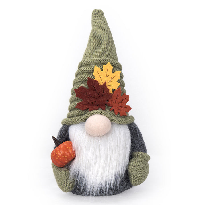 Autumn handmade decorative gnome figure with knitted hat, felt leaf application and pumpkin detail