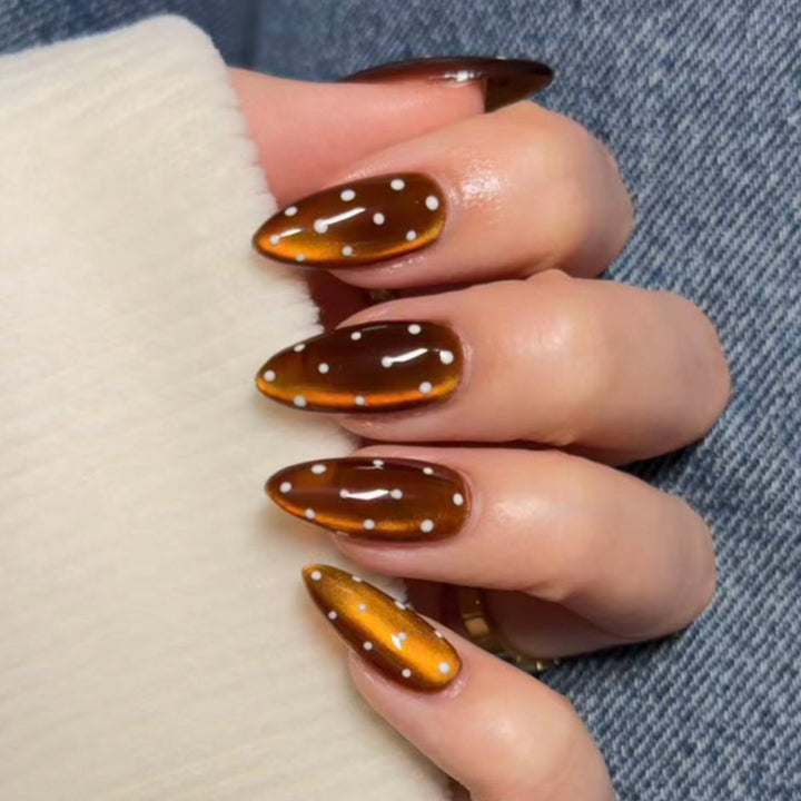 Artful nail extensions with glossy ombre effect and elegant dots Kalsten