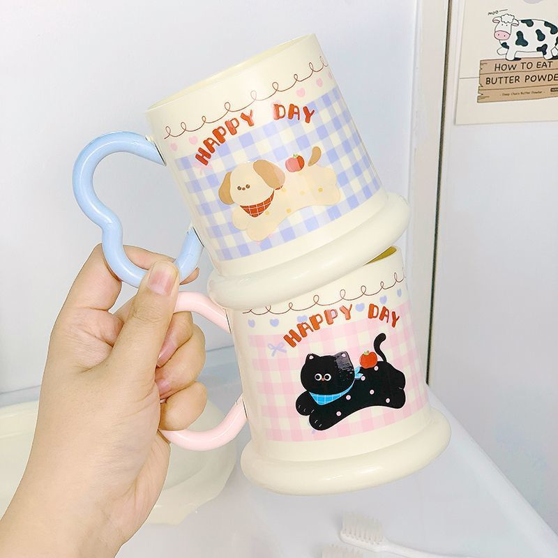 Ceramic mug with playful puppy motif Kalsten