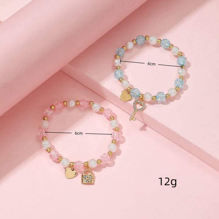Playful bracelet set with heart and key design Kalsten
