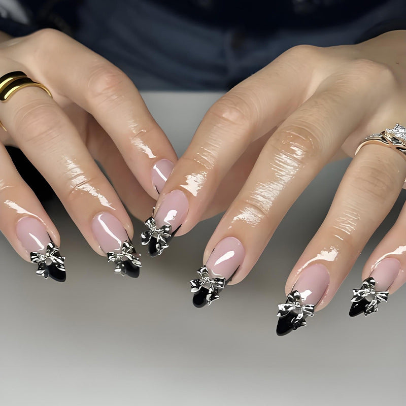 Nail art set with elegant tips and artistic embellishments Kalsten