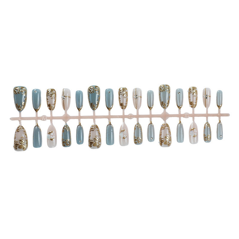 Artificial nail set with floral gold accents and elegant designs Kalsten