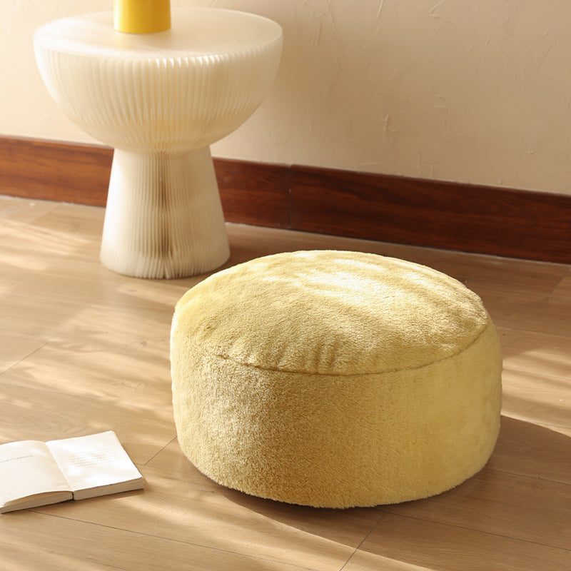 Low cow leather pouf with plush microfibre cover and shape-retaining foam filling
