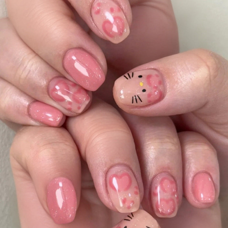 Artificial nail art with cute animal and heart motifs Kalsten