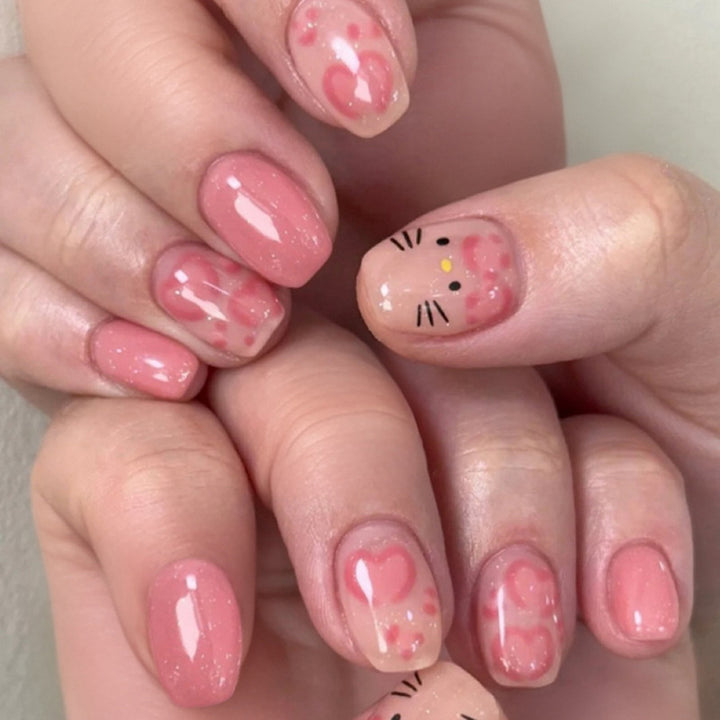 Artificial nail art with cute animal and heart motifs Kalsten