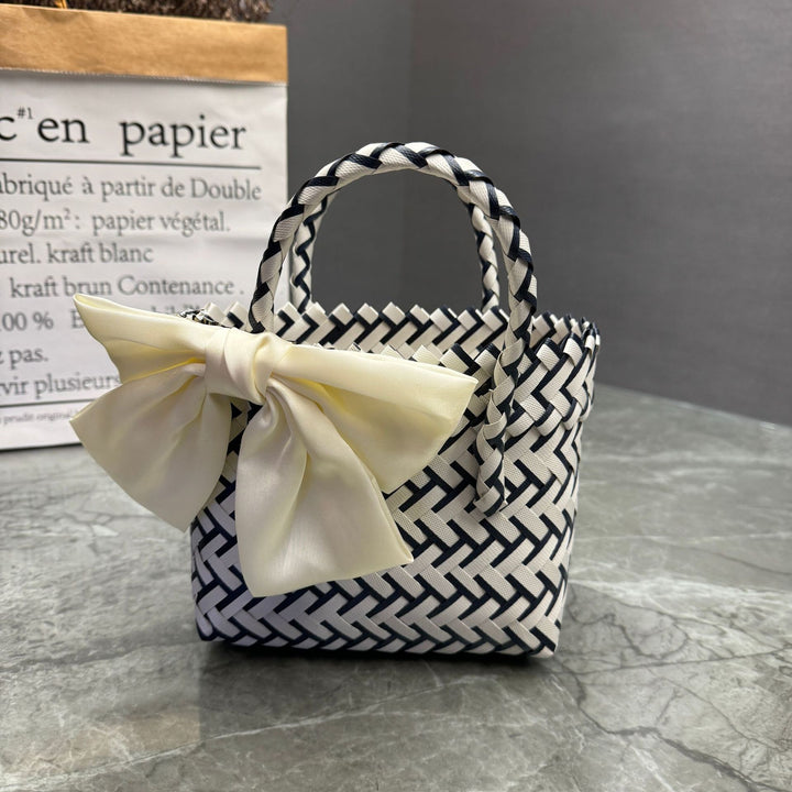 Playful basket bag with bow Kalsten