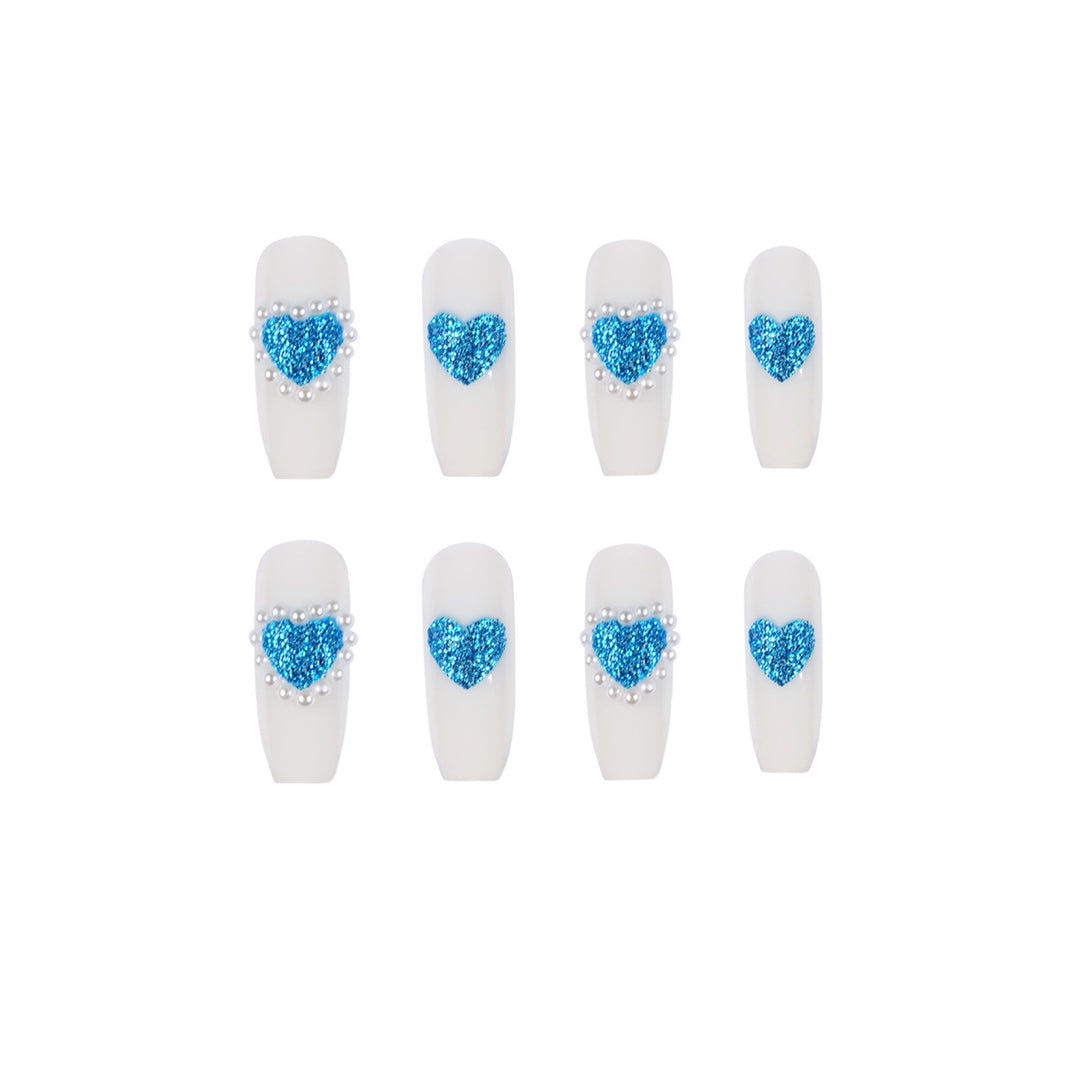 Artful nail art with heart-shaped accents Kalsten