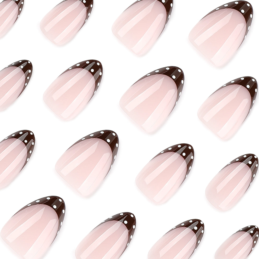 Artful nail art with elegant French tips and glitter accents Kalsten