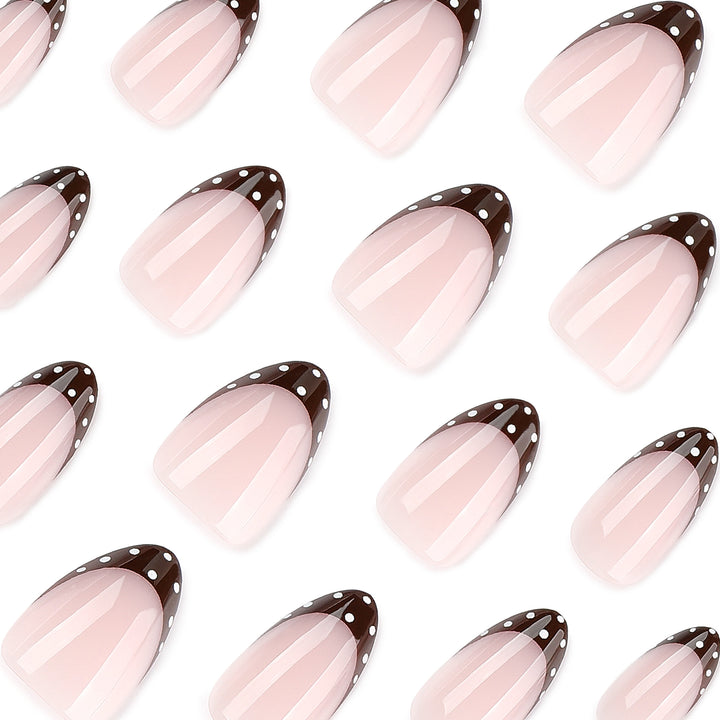 Artful nail art with elegant French tips and glitter accents Kalsten