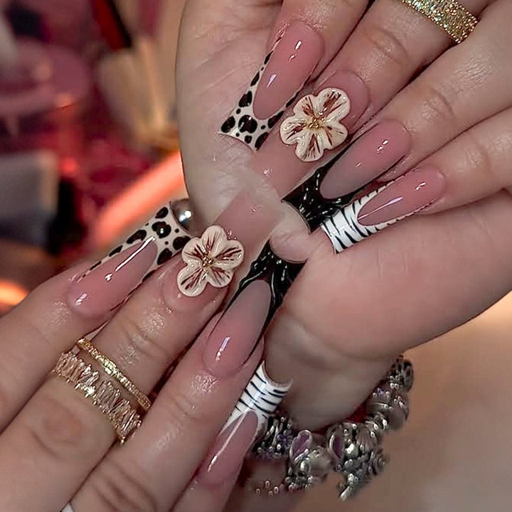 Nail art set with floral and marbled designs Kalsten