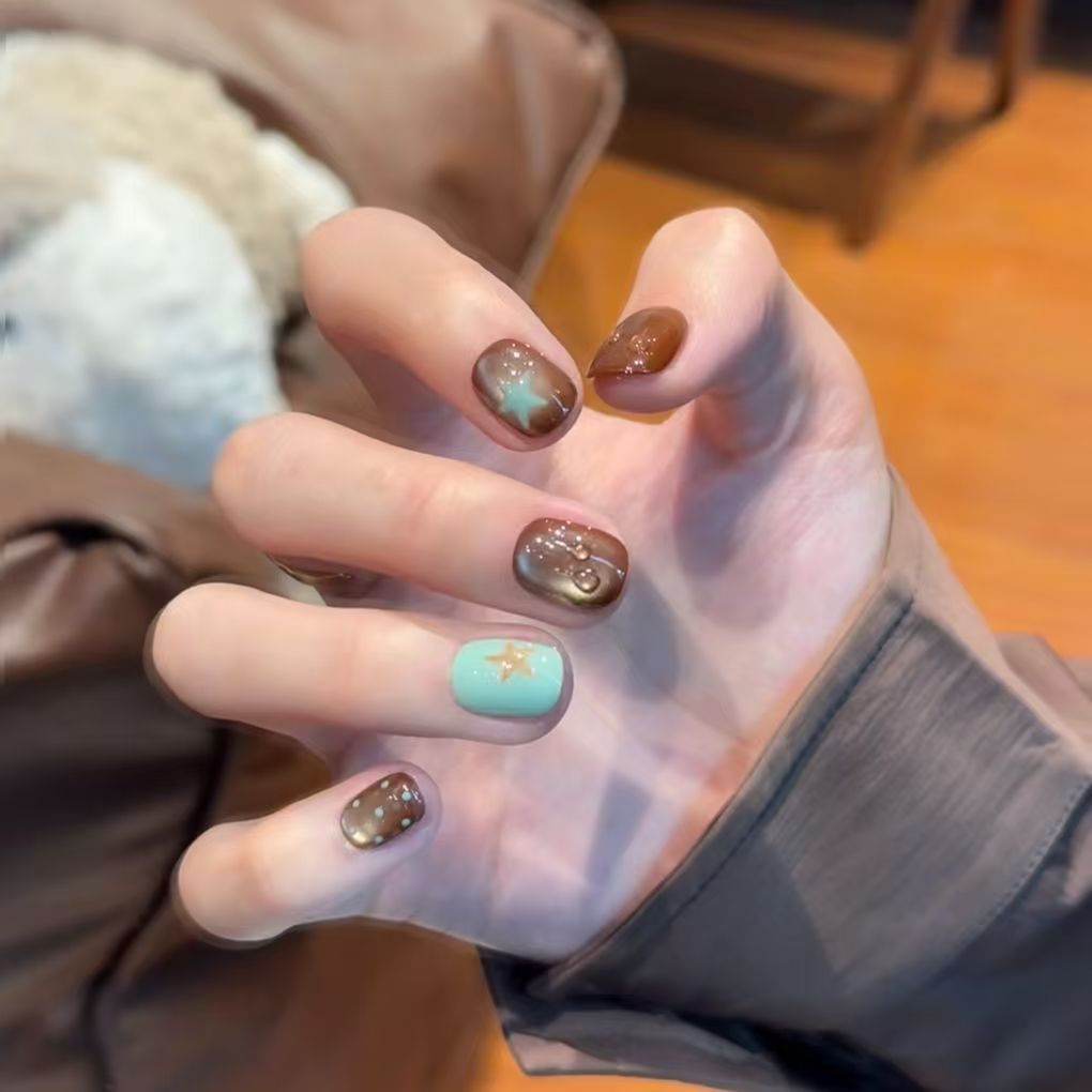 Artistic Press-On Nail Set with Star Designs