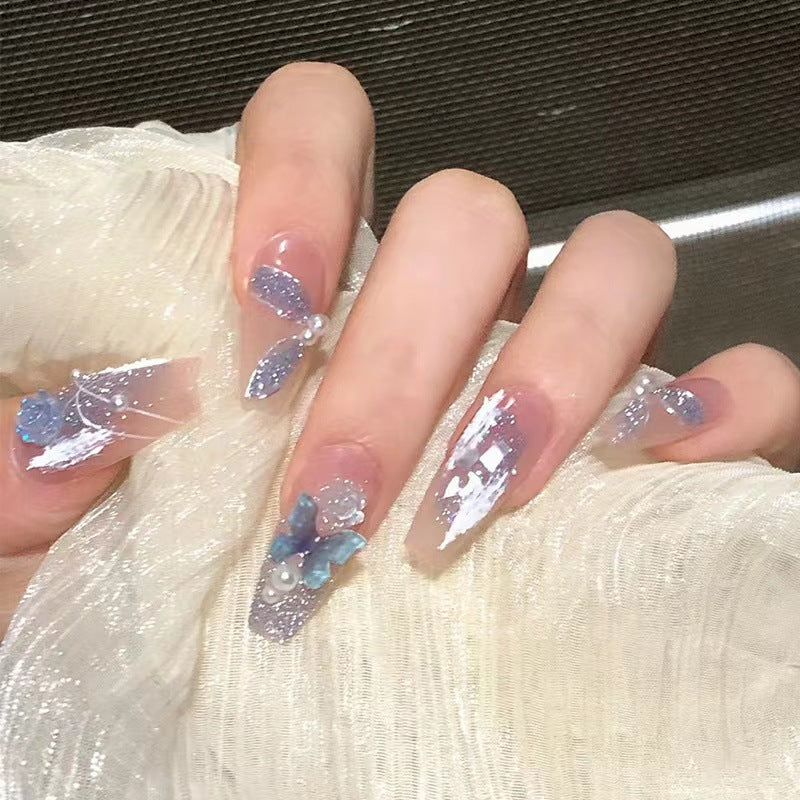 Artistic 3D nail extensions with glitter accents Kalsten