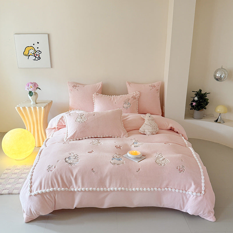 Cute cotton bedding set with embroidered bunny appliqués and pom-pom trim