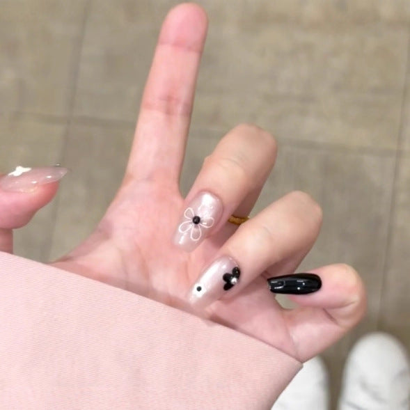Artistic Press-On Nail Set with Floral and Speckled Design Kalsten