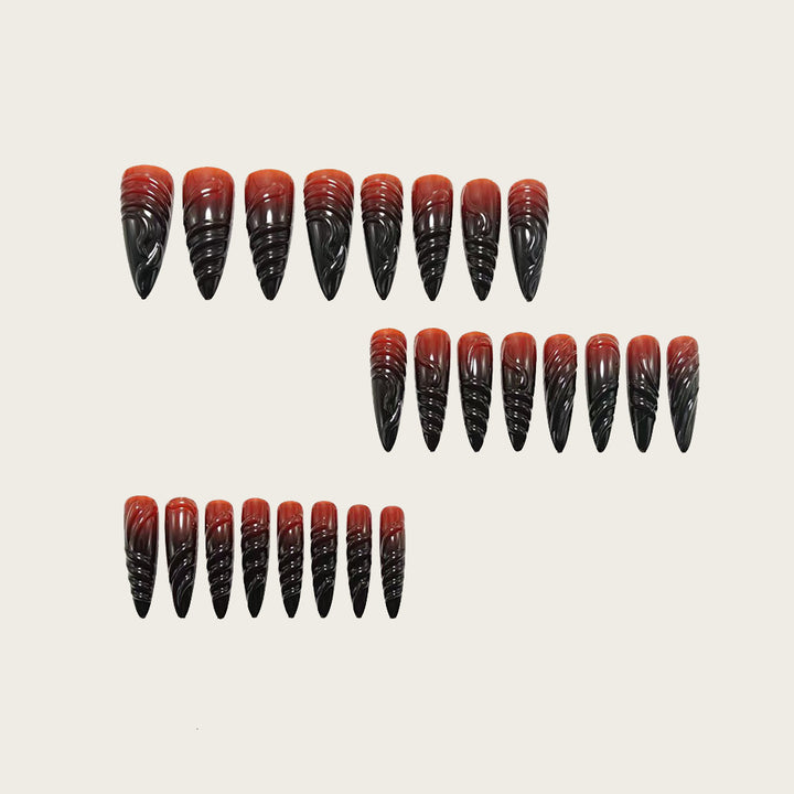 Gothic-style artificial nails with pointed tips and shiny surface Kalsten