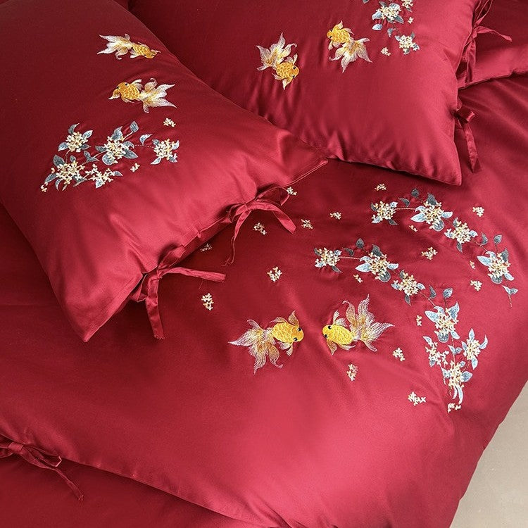 Luxurious satin bedding set with intricate floral-fish embroidery