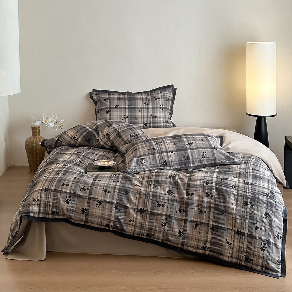 Duvet cover set with fine check pattern and subtle floral relief made of cotton blend