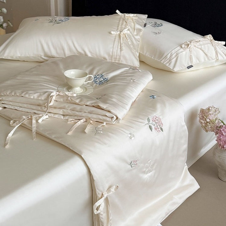 Embroidered satin bedspread set with ties and silky-glossy surface