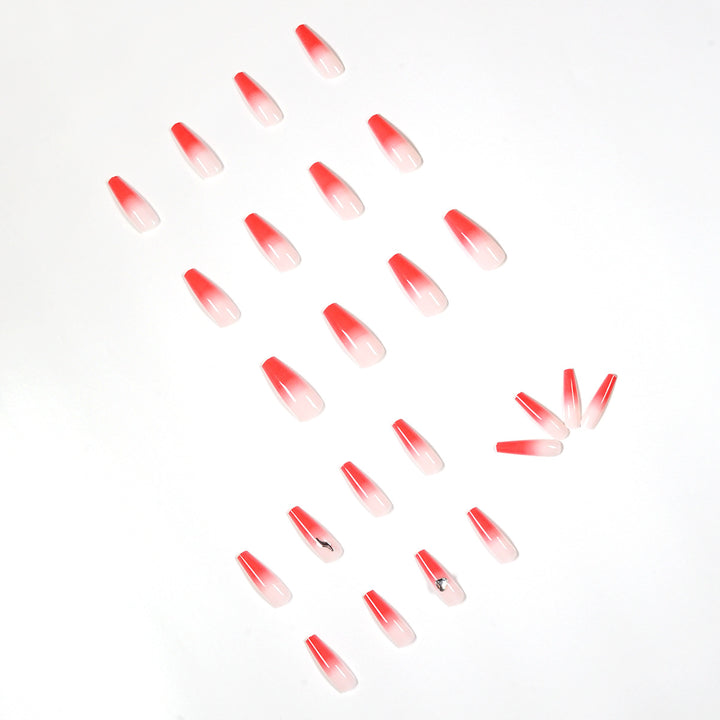 Artful stiletto nails with elegant gradient and rhinestone embellishment Kalsten
