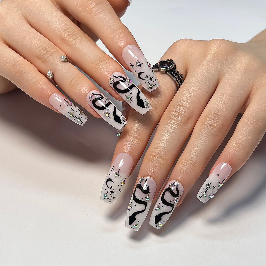 Artful gel nails with elegant 3D design and glitter accents Kalsten