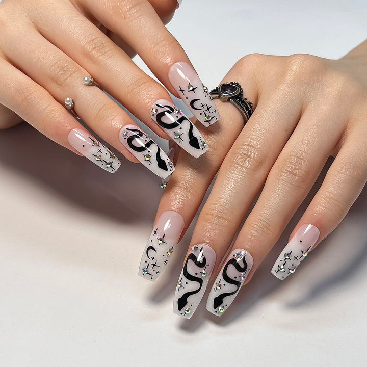 Artful gel nails with elegant 3D design and glitter accents Kalsten