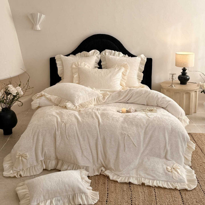 Romantic ruffle bedding set with bow appliqués and soft touch