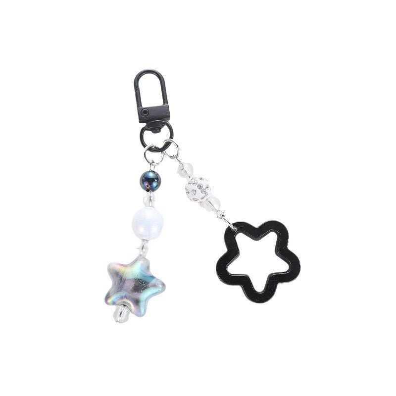 Playful keychain with floral and star motif Kalsten
