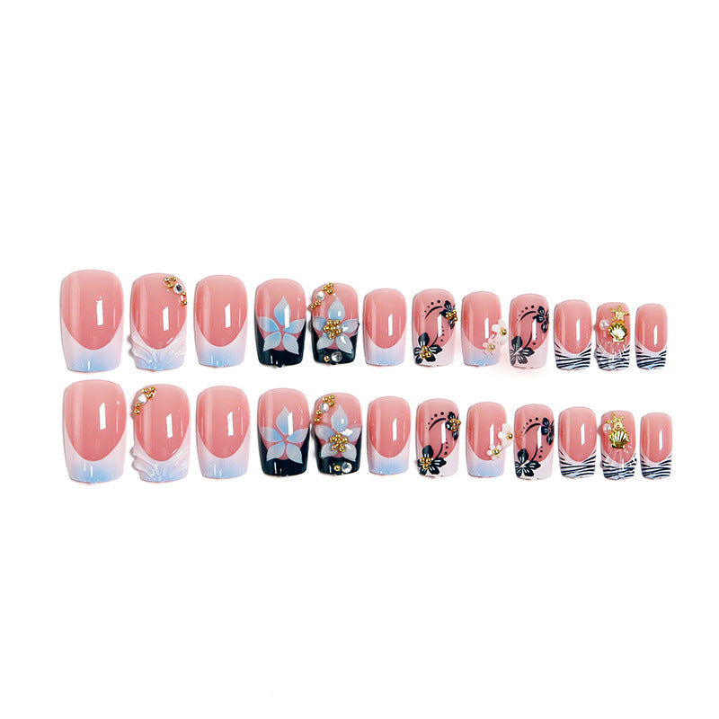 Artificial nails in creative floral design with glitter accents Kalsten
