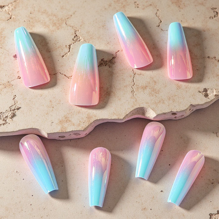 Artificial nails in modern glitter gradient design Kalsten