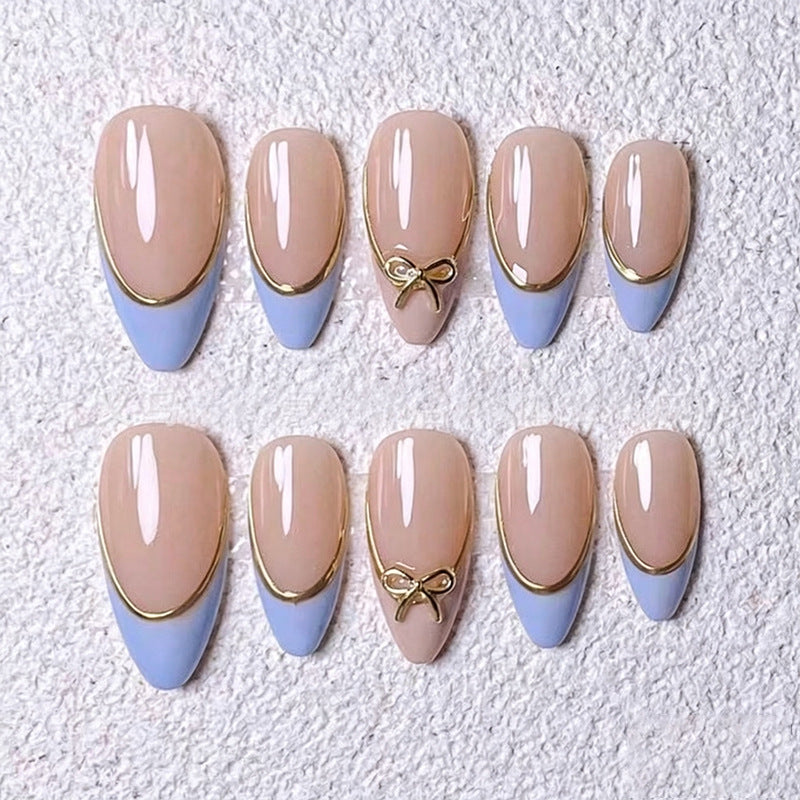 Acrylic nail set with elegant designs and gold accents Kalsten