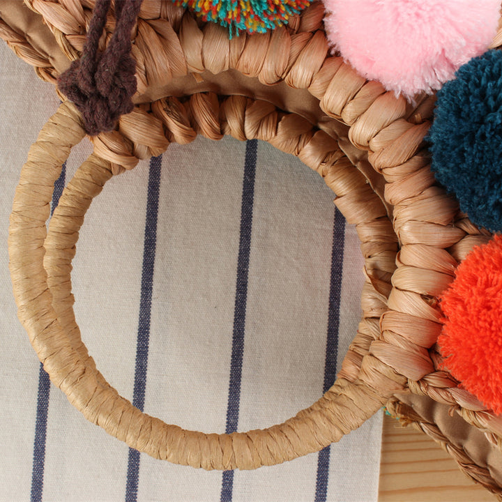 Basket bag with colorful pompons and carrying straps Kalsten