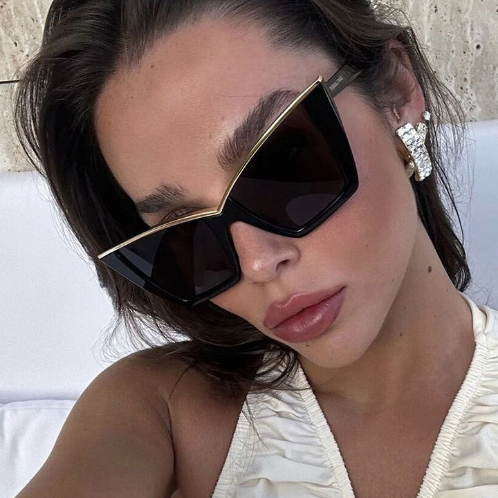 Women extravagant sunglasses with unique design and golden accents Kalsten