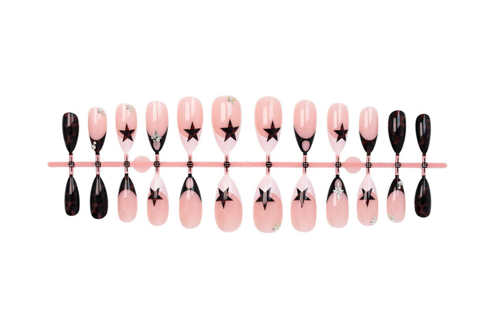 Acrylic nail set with creative star patterns and glitter accents Kalsten