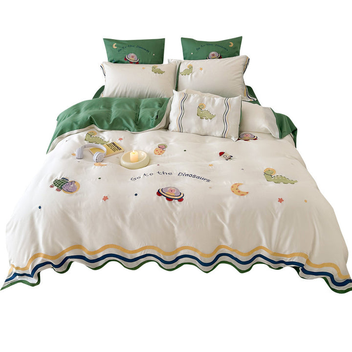 Children's bedding set with embroidered doll appliqués, ruffle and cuddle pillow