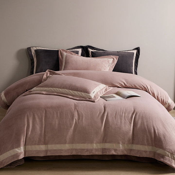 Luxurious velvet bedding set with contrasting satin trim