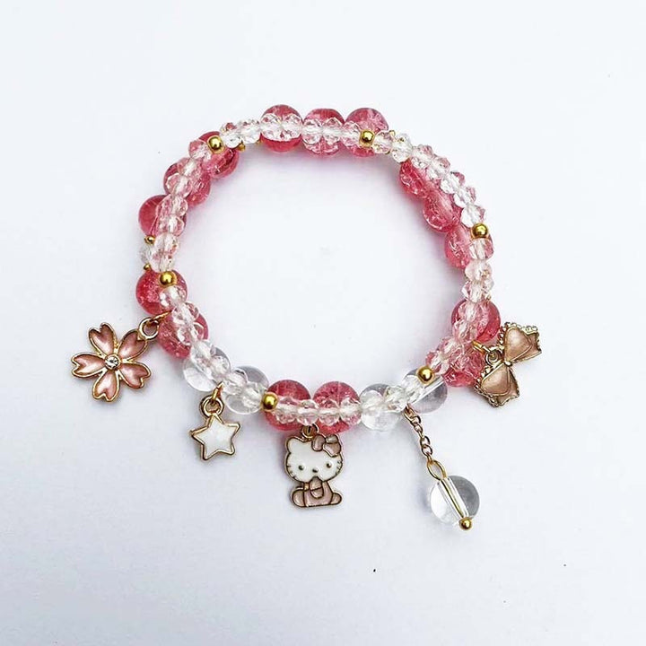 Elegant bracelet with animal and glitter pendants Kalsten