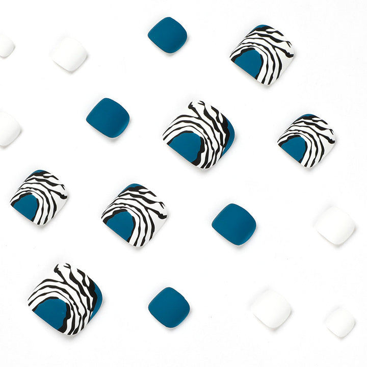 Artful toenail design in modern zebra pattern Kalsten
