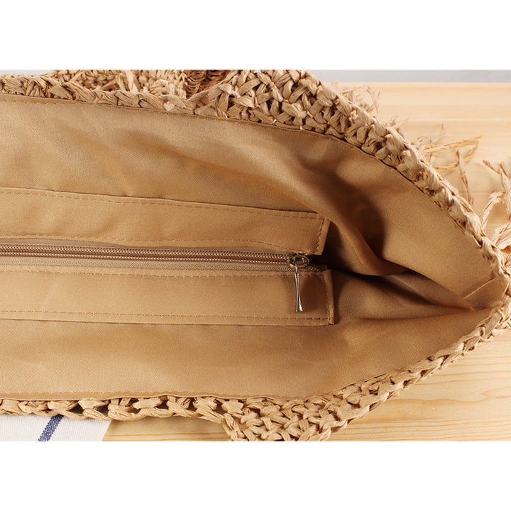 Designer straw bag with fringe decoration Kalsten